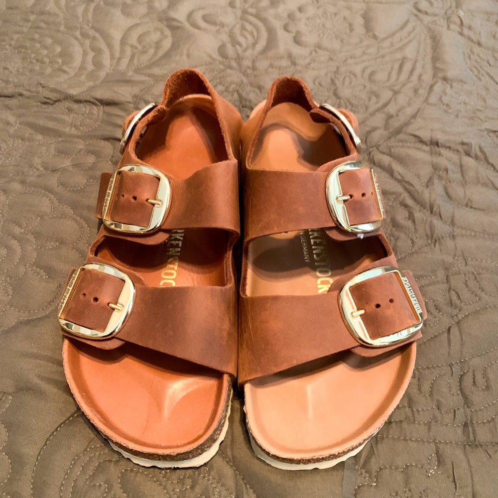 Birkenstock’s cognac color size 38 (7-7.5)